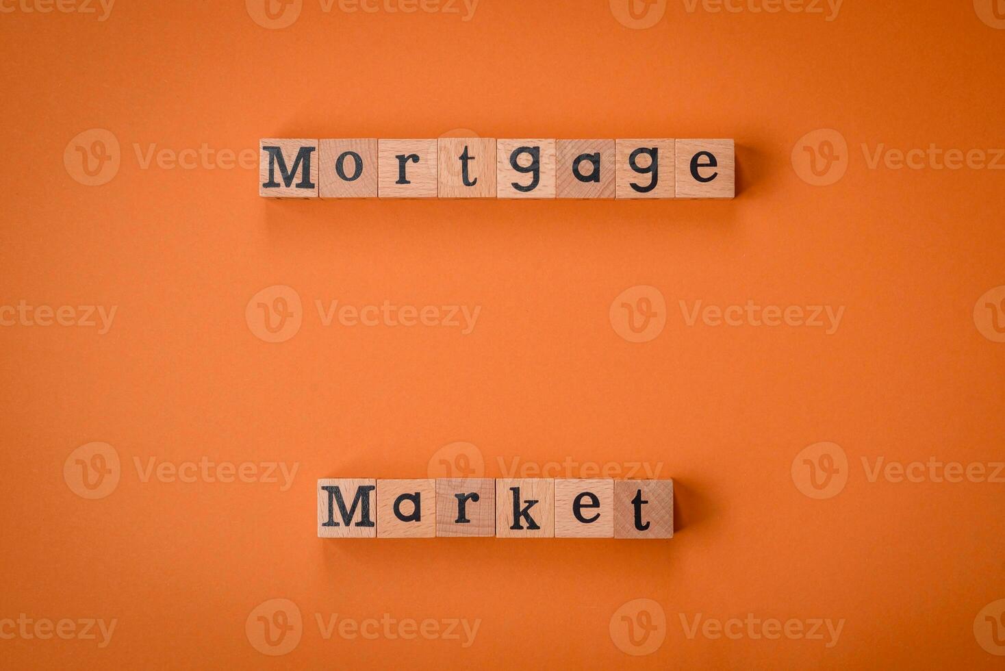 A small wooden house and keys as an idea for investing in your own home photo