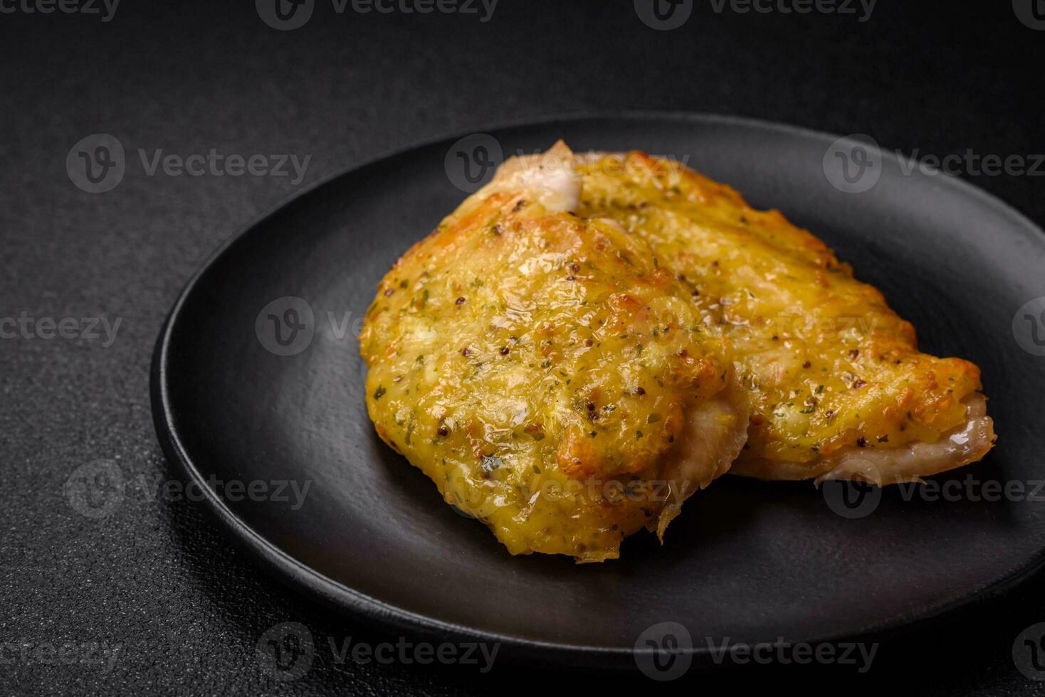 Delicious meat fried with Dijon mustard with salt, spices and herbs photo