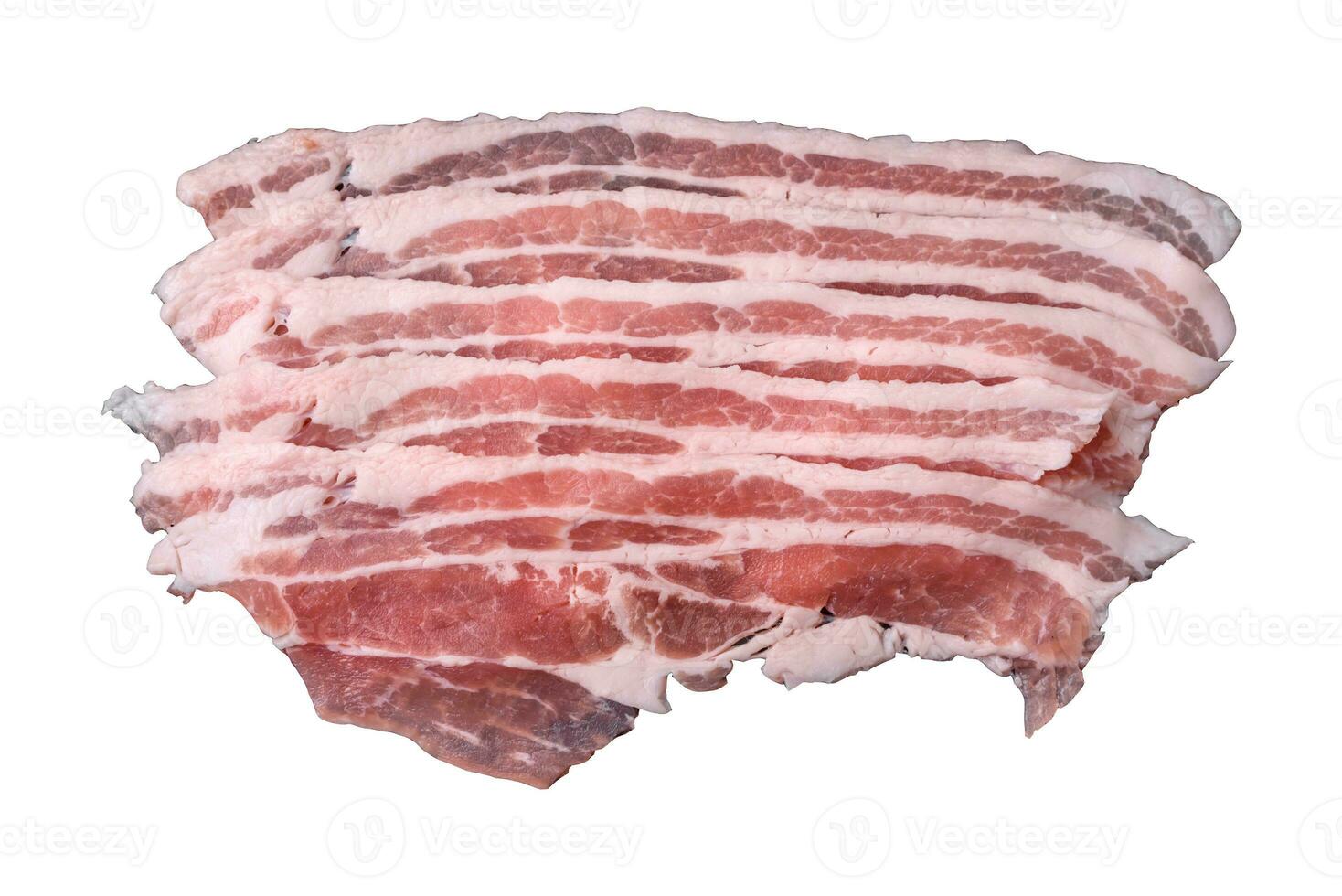 Fresh raw bacon cut into slices with salt, spices and herbs photo