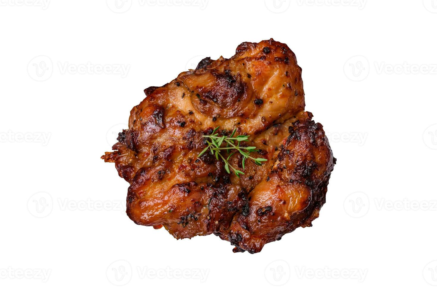 Delicious baked chicken meat with salt, spices and herbs photo