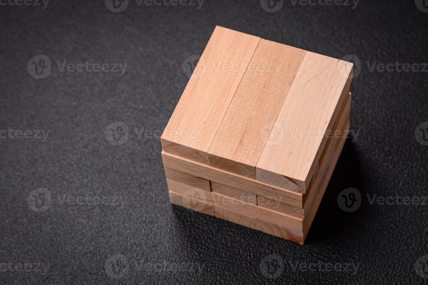 Wooden blocks of Jenga game as a concept idea of risk in achieving a goal photo