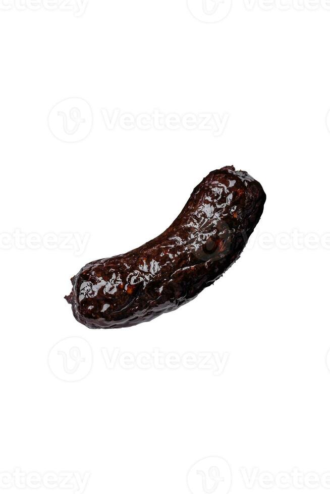 Delicious black blood sausage or black pudding with spices and herbs photo