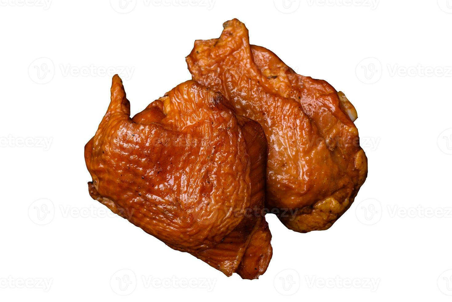 Delicious fried or smoked chicken thighs grilled with spices and herbs photo