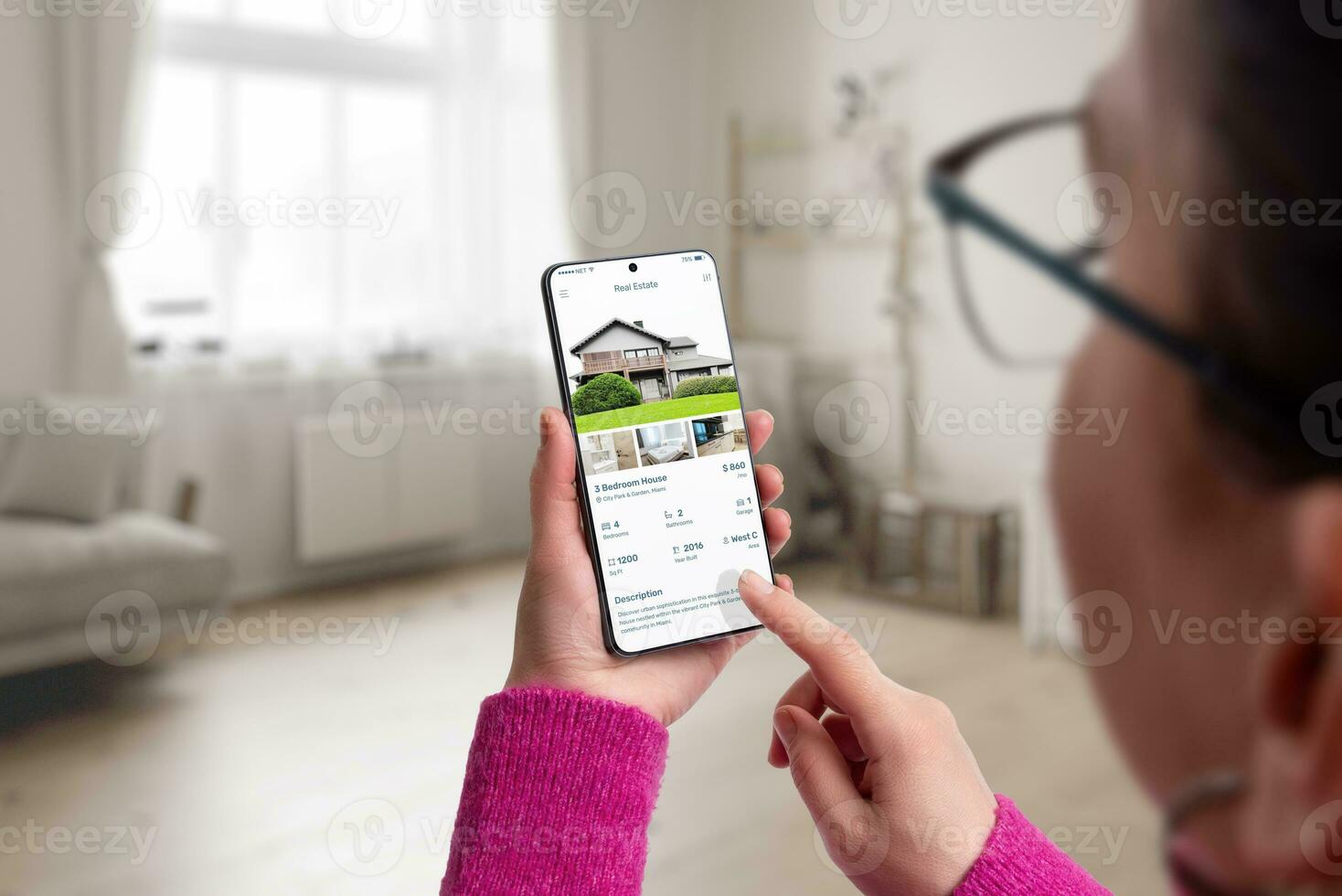 AI generated Smartphone with a residential real estate app on display in woman hands. Living room interior in the background, blending modern technology with home search photo