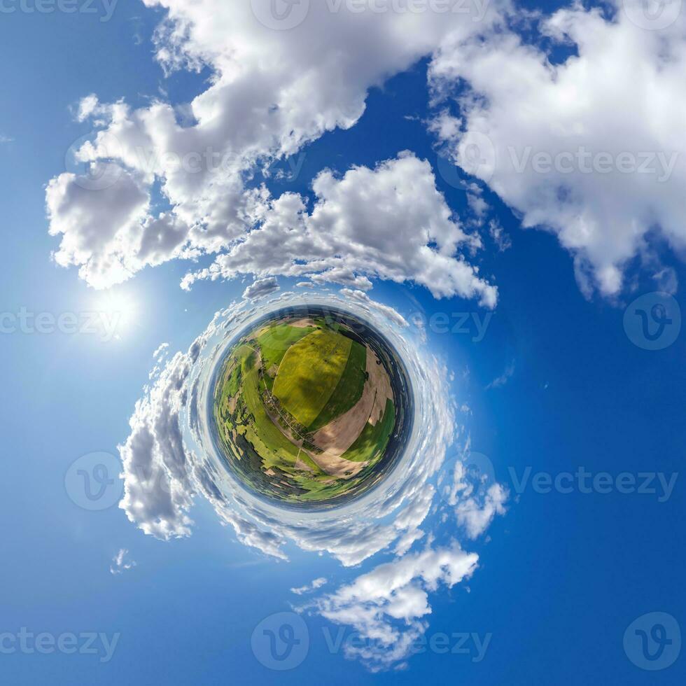 simple tiny planet without buildings in blue sky with beautiful clouds. Transformation of spherical panorama 360 degrees. Spherical abstract aerial view. Curvature of space. photo