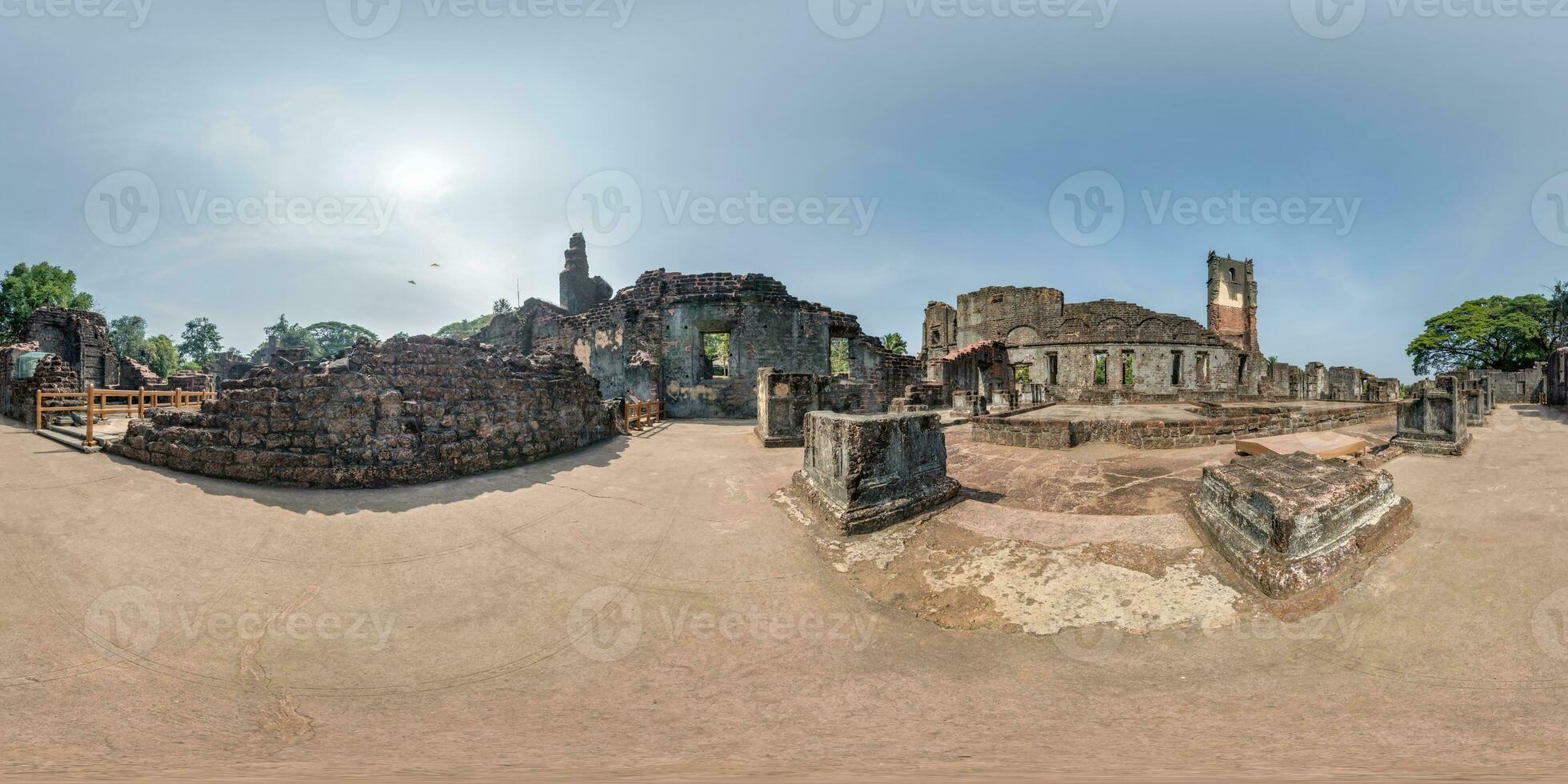 full spherical hdri 360 panorama near stone abandoned ruined tower of portugese church in old goa india in equirectangular projection, VR AR virtual reality content photo
