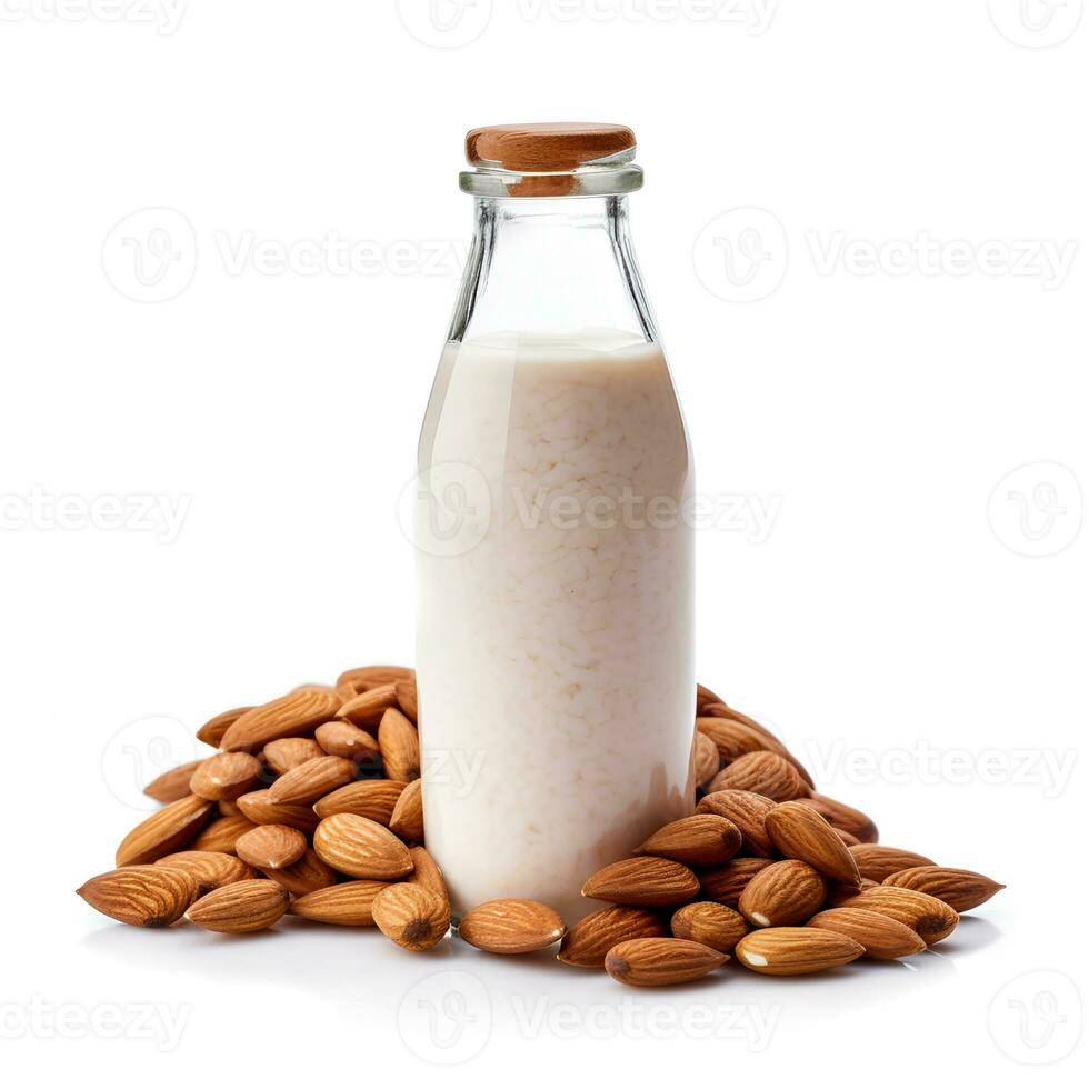 bottle of almond milk and an almond nut photo