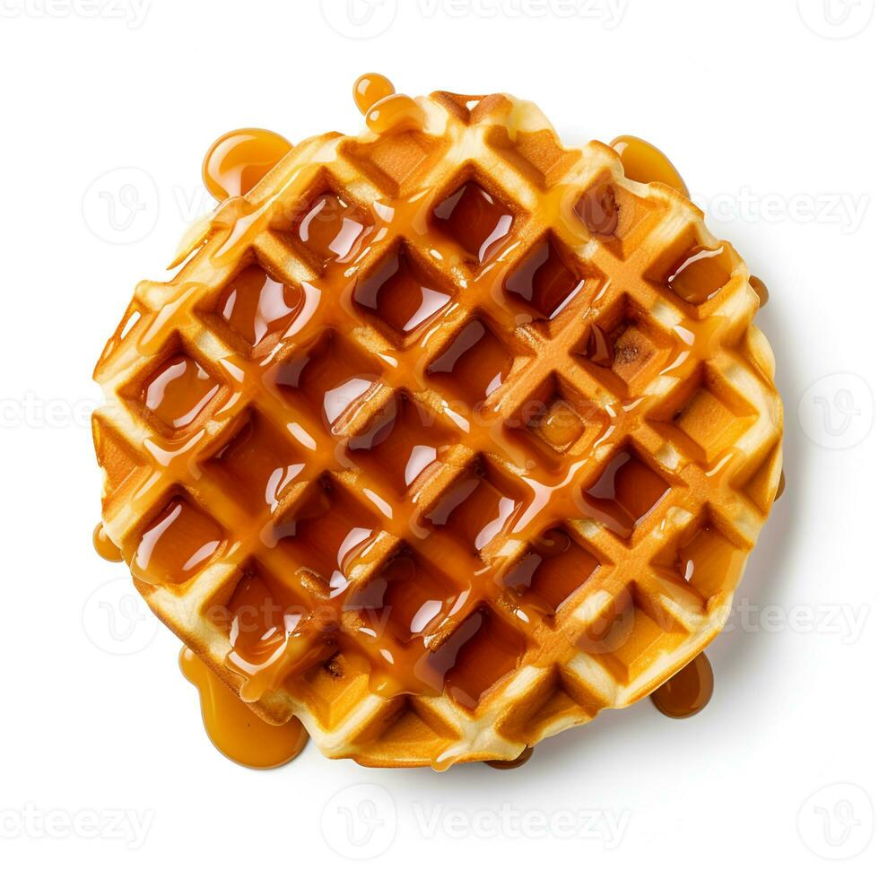 Viennese waffles with caramel syrup on a white background. photo