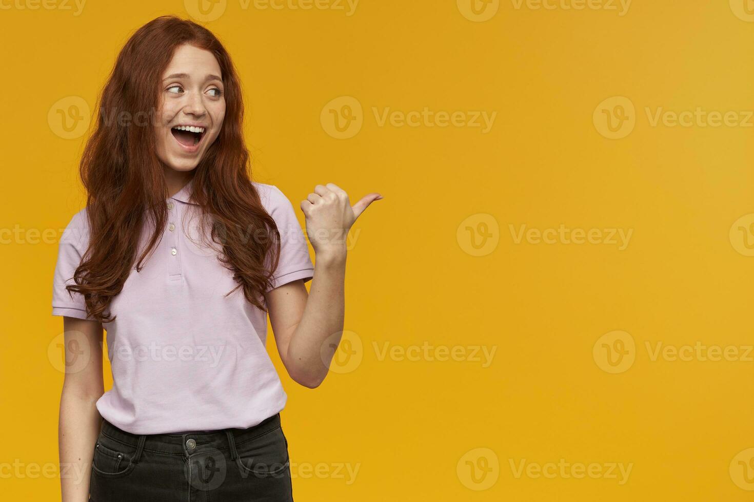 girl standing over yellow background photo