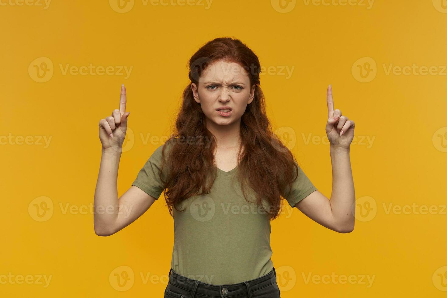 girl standing over yellow background photo
