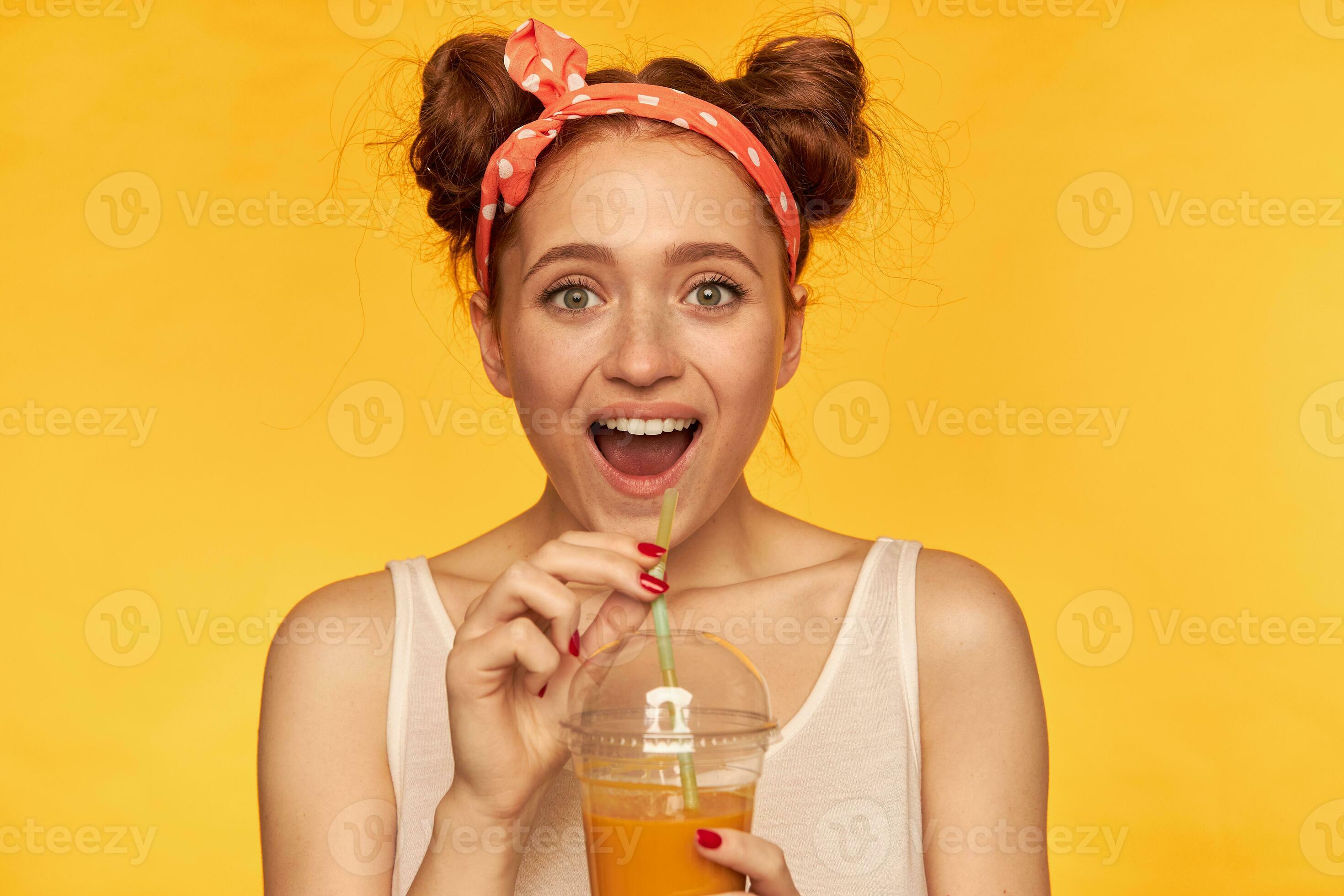 Teenage Girl Happy Looking Red Hair Woman With Buns Wearing White Shirt And Red Doted Hairband 