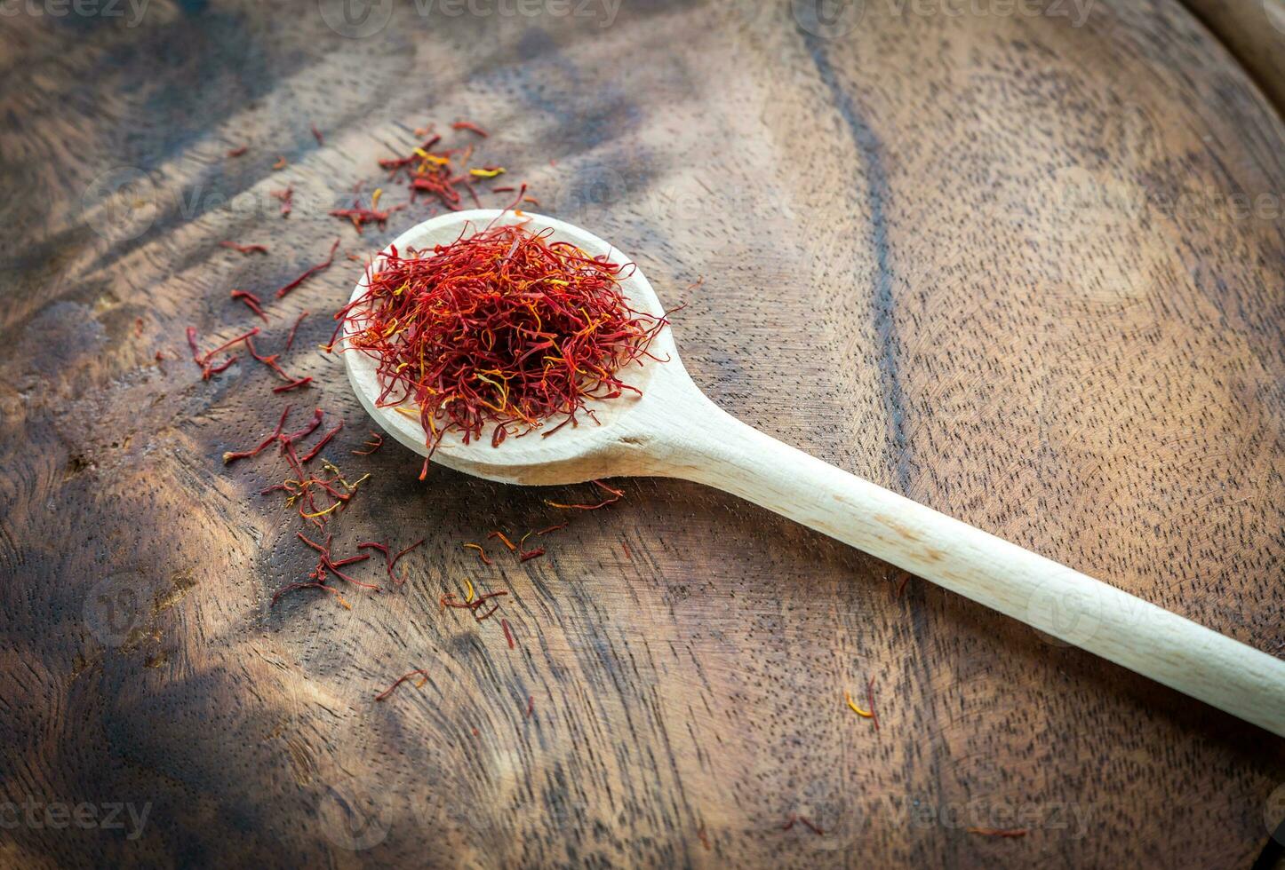 Saffron on the wooden spoon photo