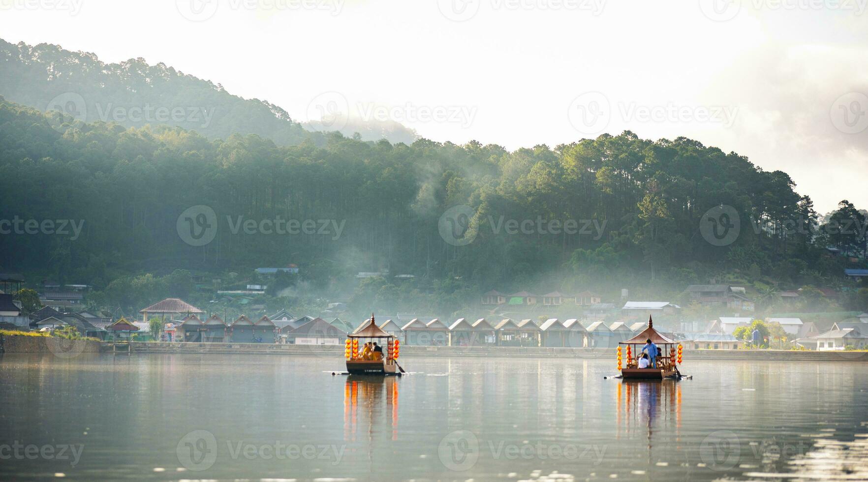 Ban Rak Thai, Mae Hong Son resort in green tea plantation on the hill and lake at village, chinese style hotel and resort, famous tourist attractions is another landmark of North Thailand. photo