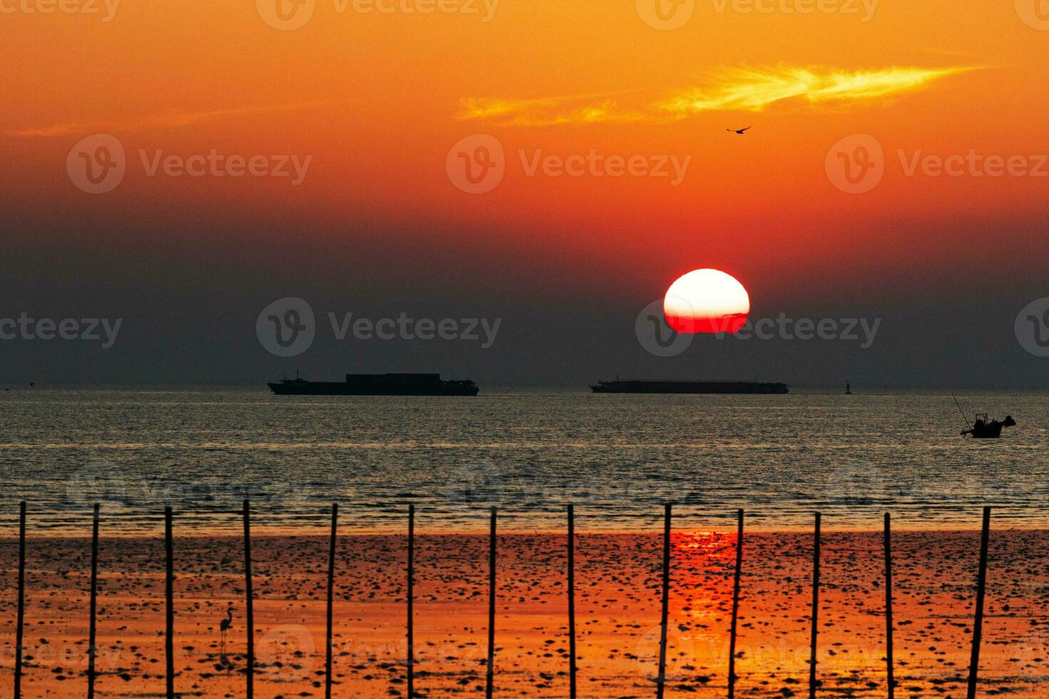 Sunset sky on twilight in the sea Evening with Orange Gold Sunset Nature Sky Background, Horizon Golden Sky, beautiful clouds, Dusk sky photo
