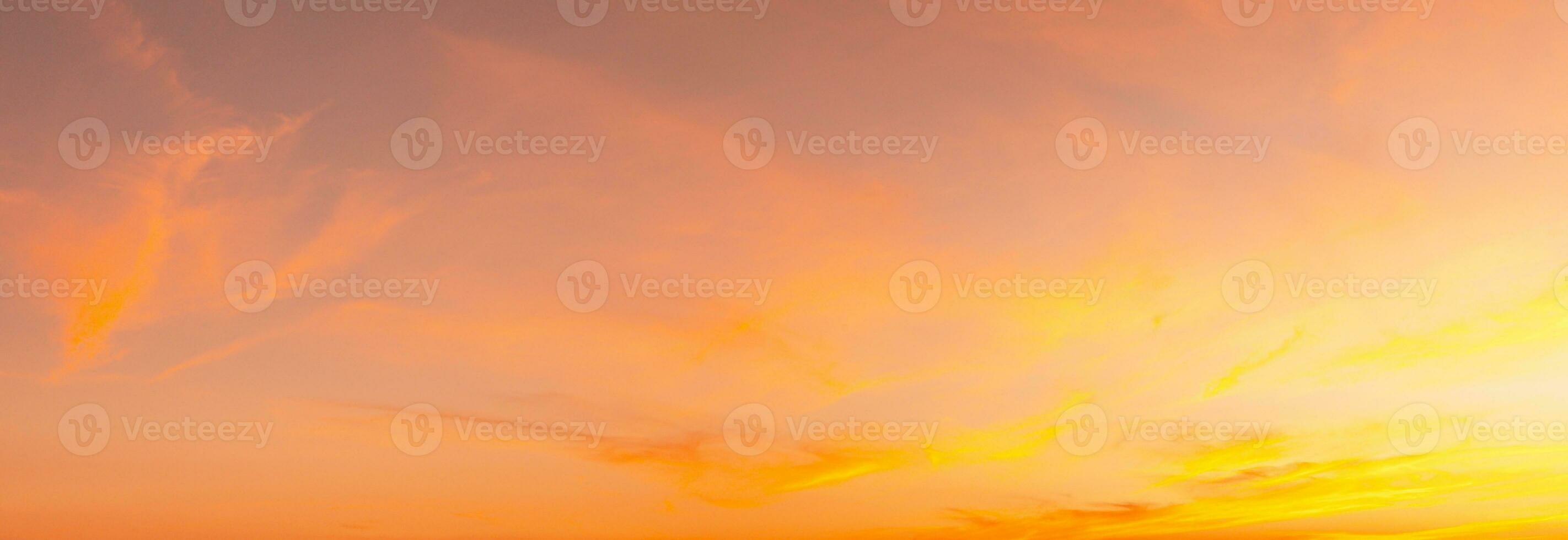 Sunset Sky on Twilight in the winter Evening with Orange Gold Sunset Cloud Nature Colorful Sky Backgrounds, Horizon Golden Sky, Gorgeous. photo