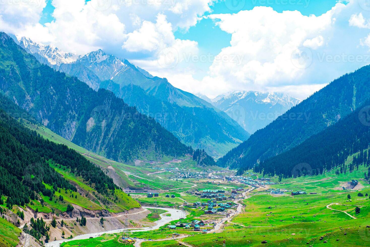 Landscape in the mountains. Panoramic view from the top of Sonmarg, Kashmir valley in the Himalayan region. meadows, alpine trees, wildflowers and snow on mountain in india. Concept travel nature. photo