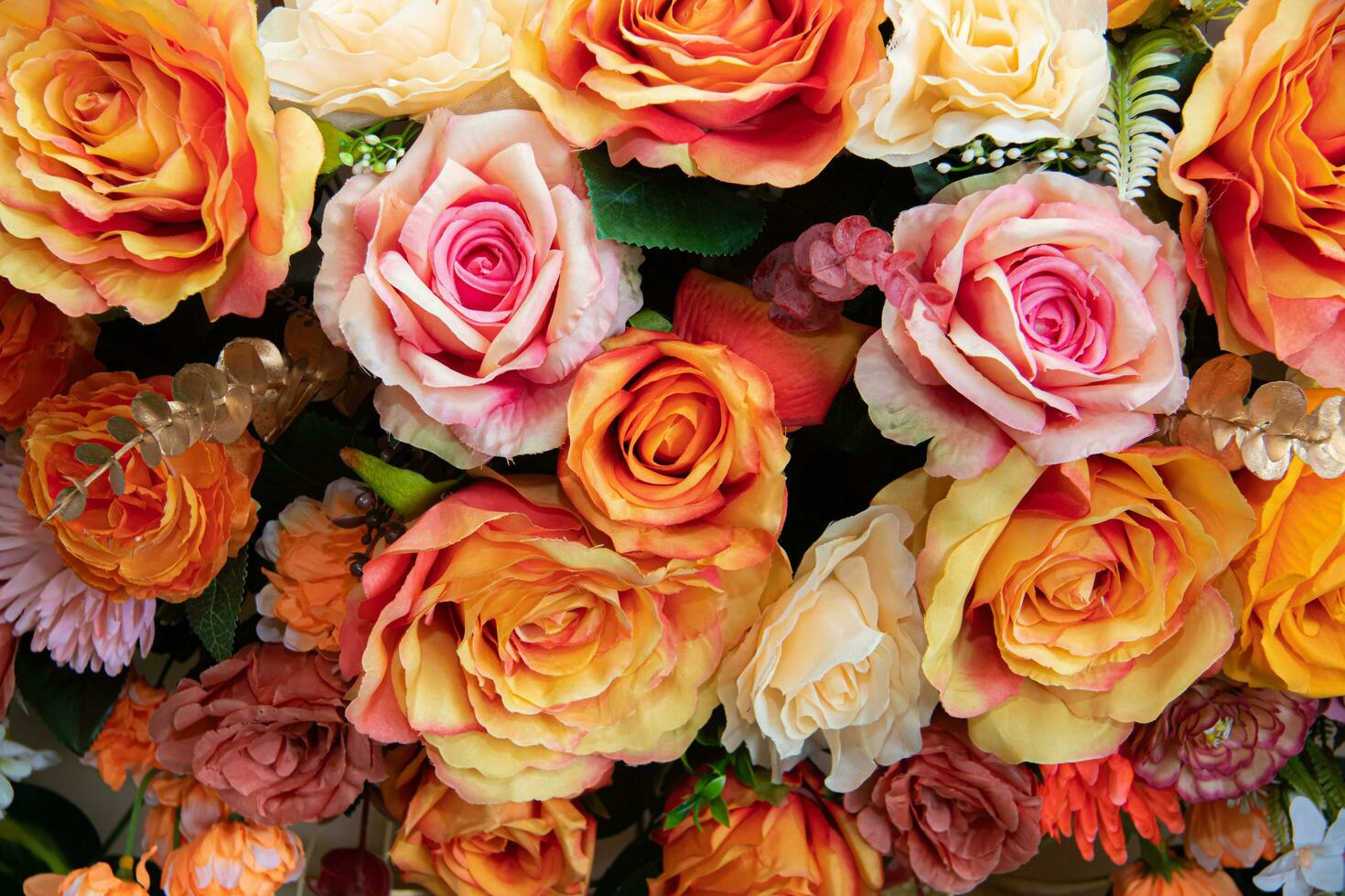 Close-up of colorful artificial flowers for decoration, full frame, background, wallpape photo