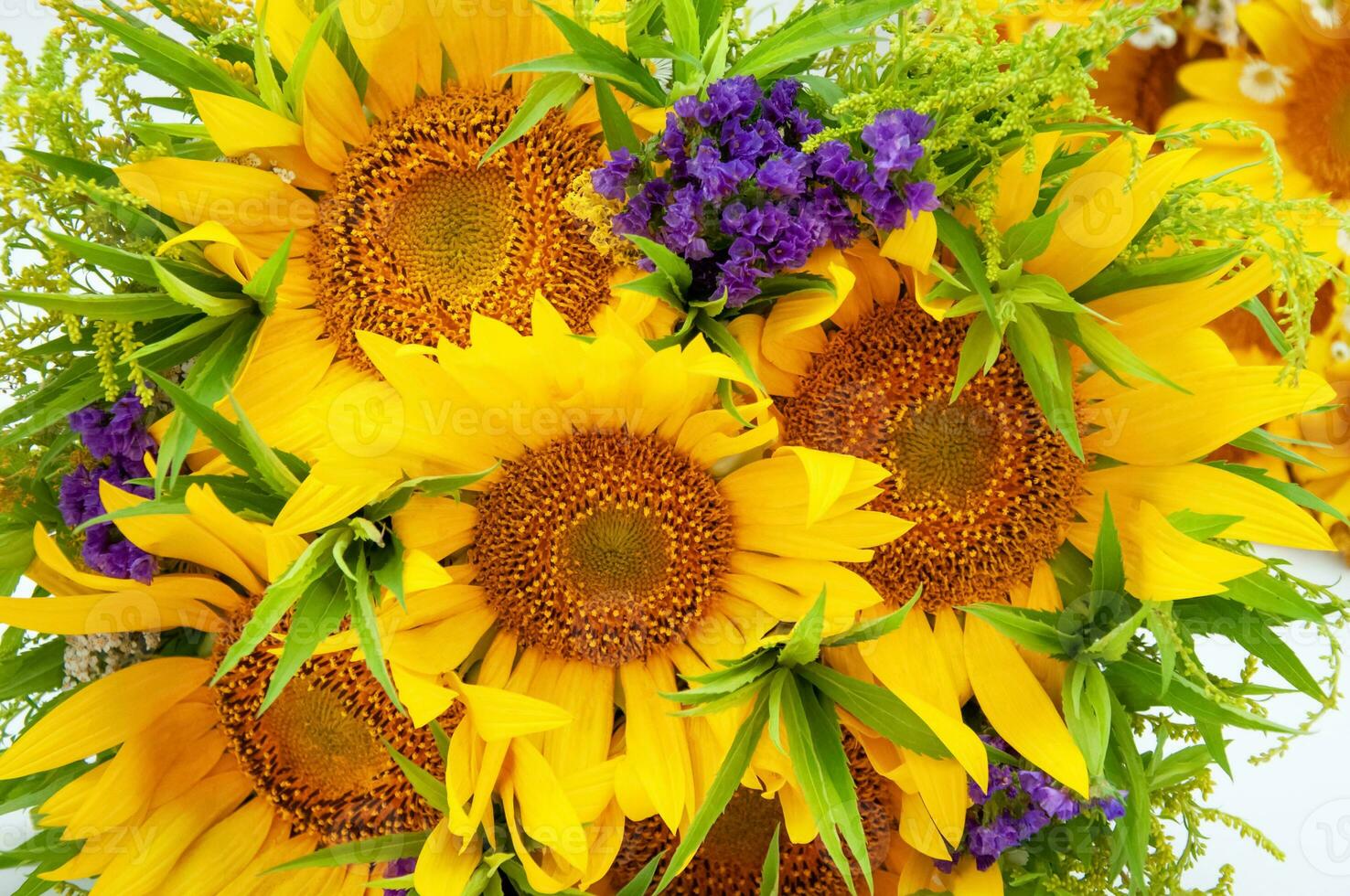 Bouquet of sunflowers and lavender isolated on white background photo