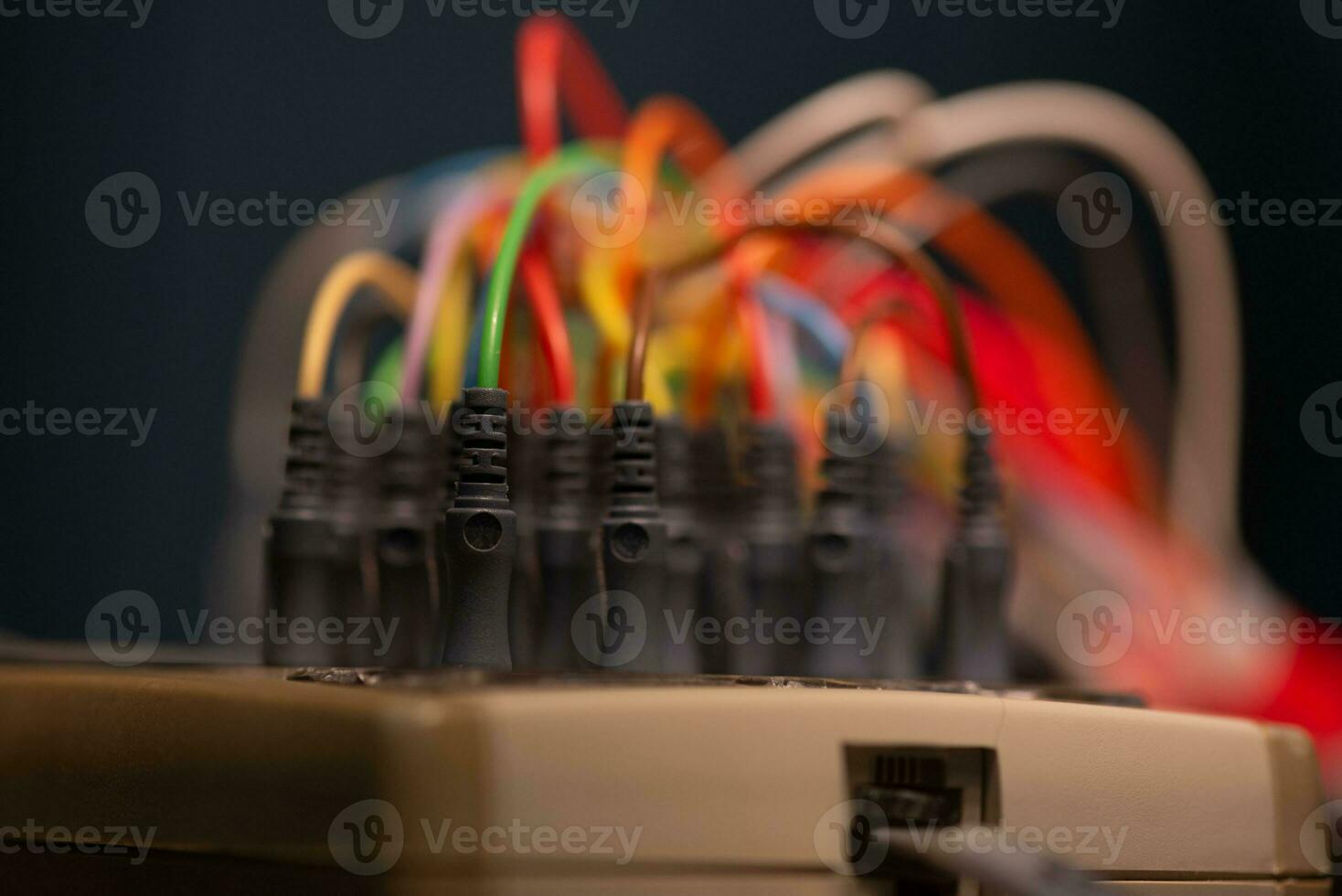 Close-up view of EEG cables plugged-in to the socket photo