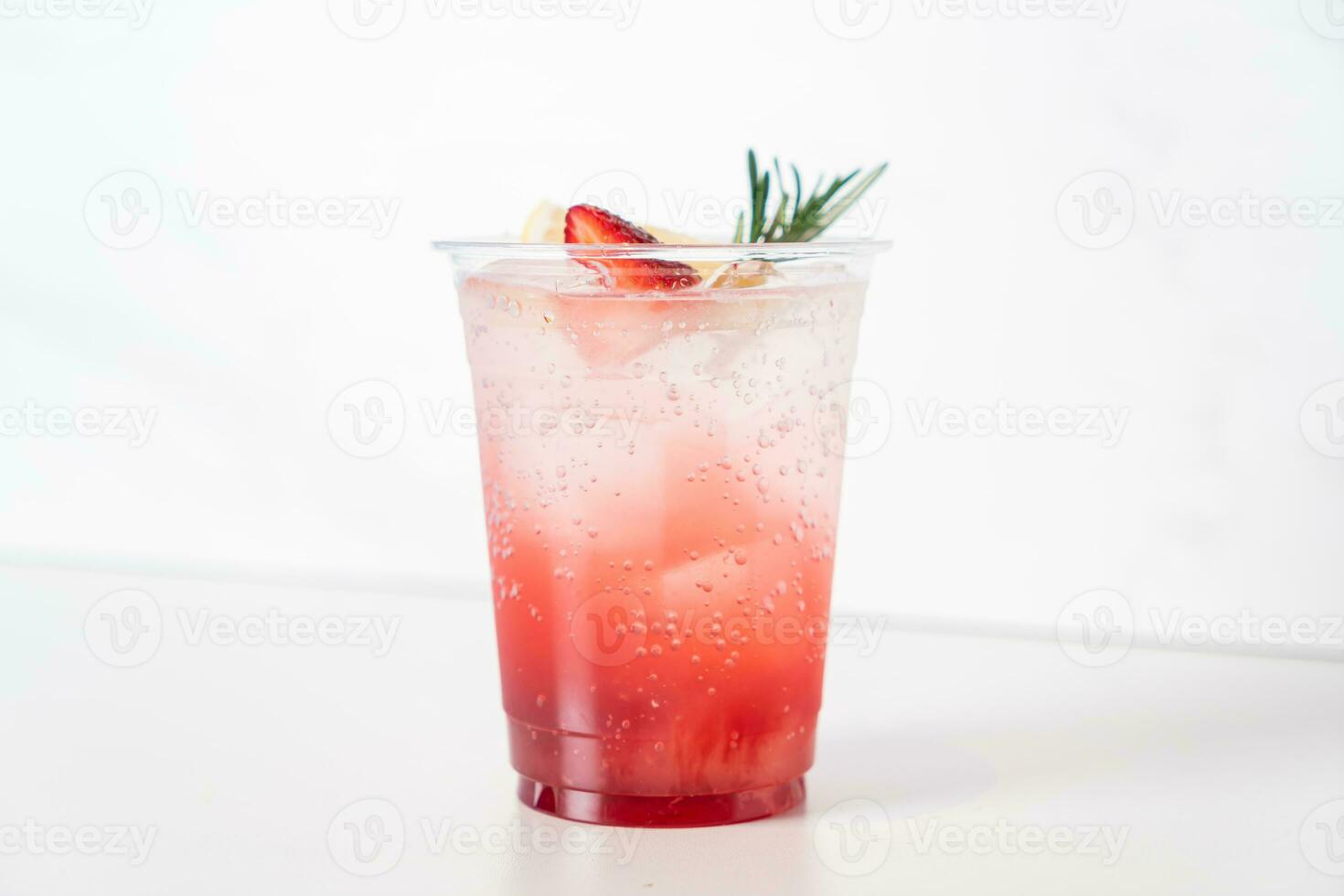 strawberry with soda in glass photo