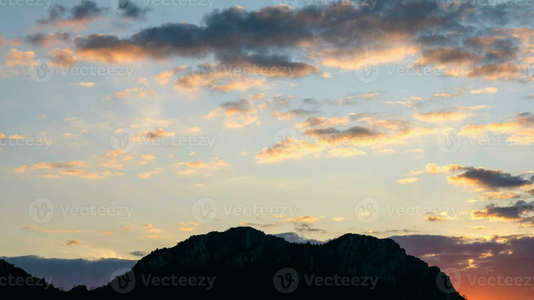Sunset sky with twilight color sky and clouds for background or sunrise sky and cloud at morning. photo