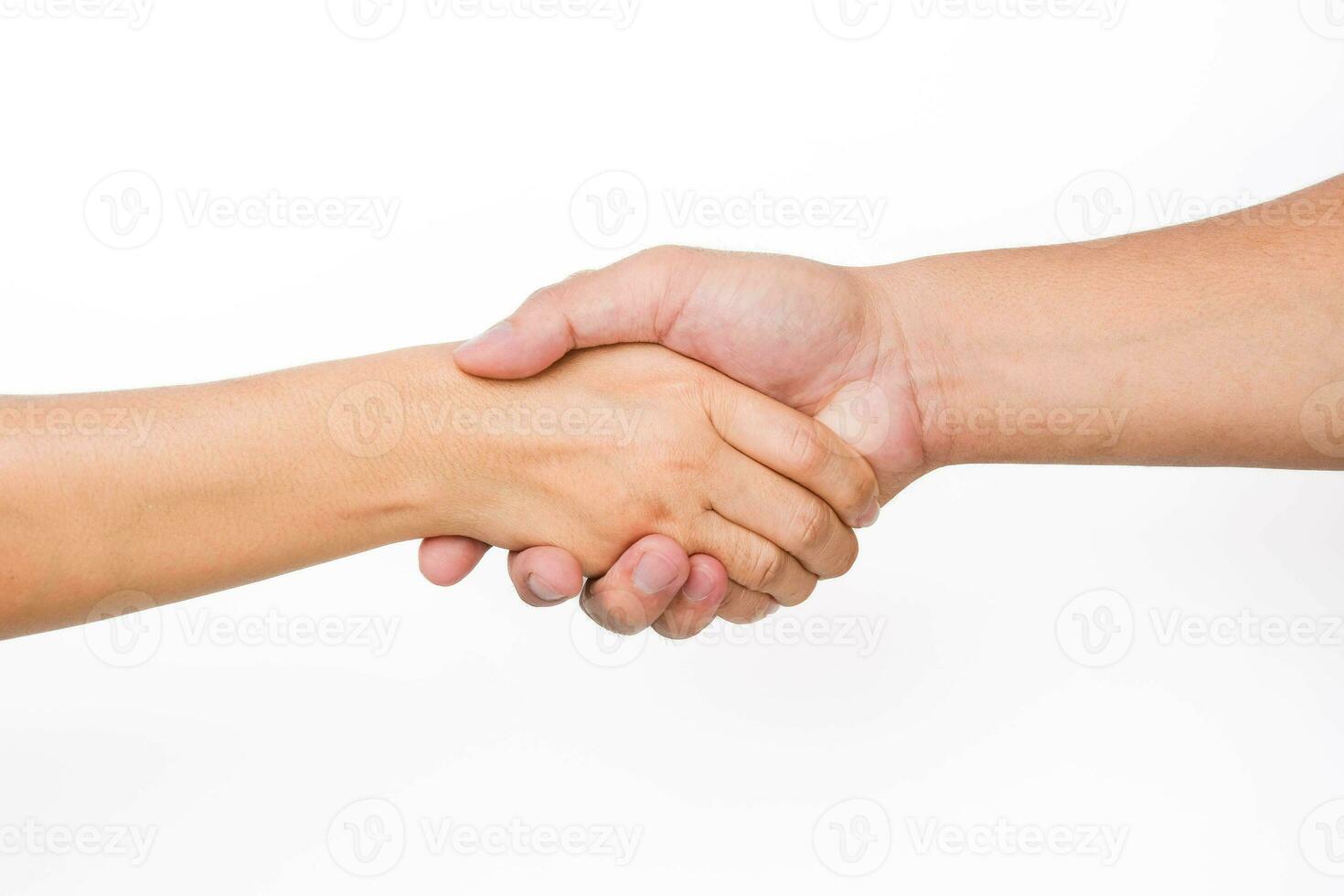 Hands of men and women shaking hands. Two people holding hands on white background. That can mean helping, caring, protecting, loving, caring and world peace concept. photo