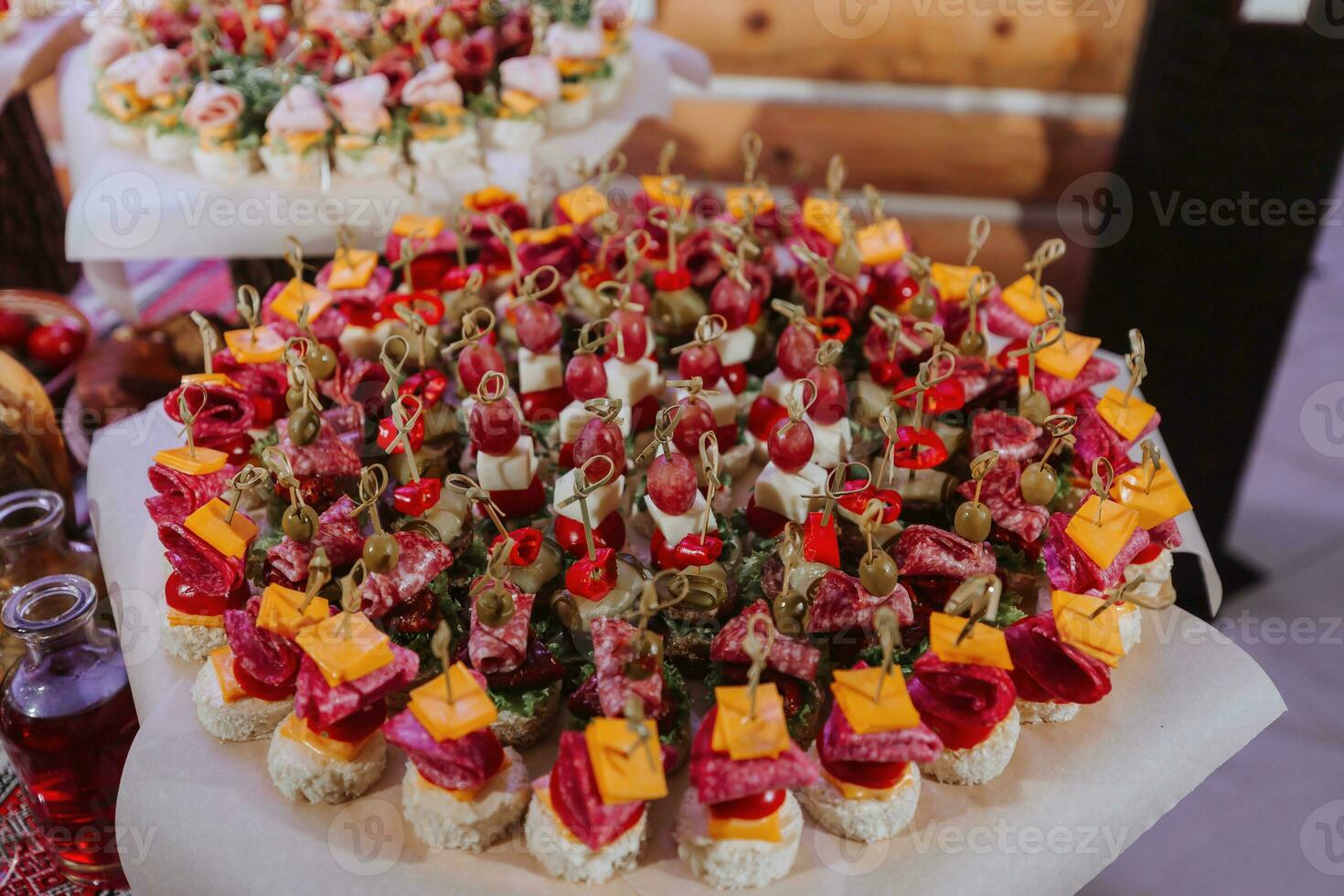 Cossack table in the best restaurants. Festive table at the wedding. National Ukrainian cuisine. Fat, sausages, alcohol. Catering. photo