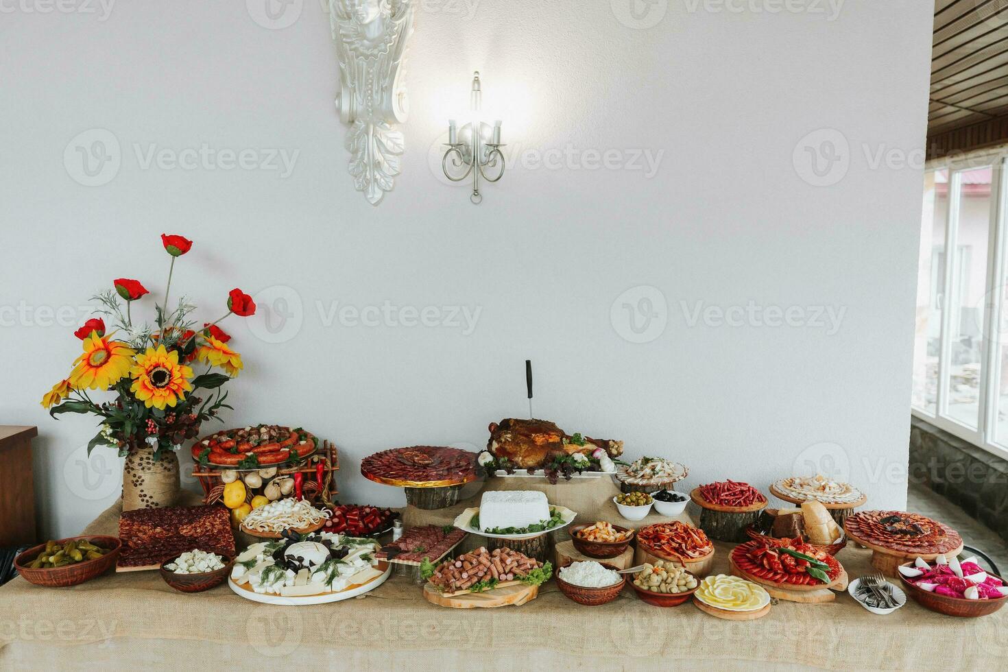 Cossack table in the best restaurants. Festive table at the wedding. National Ukrainian cuisine. Fat, sausages, alcohol. Catering. photo