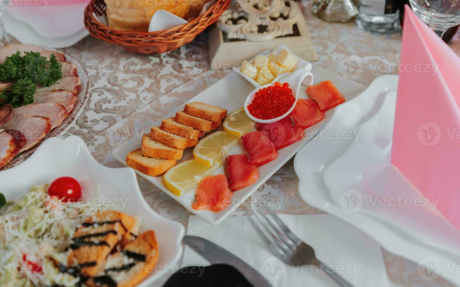 Cossack table in the best restaurants. Festive table at the wedding. National Ukrainian cuisine. Fat, sausages, alcohol. Catering. photo