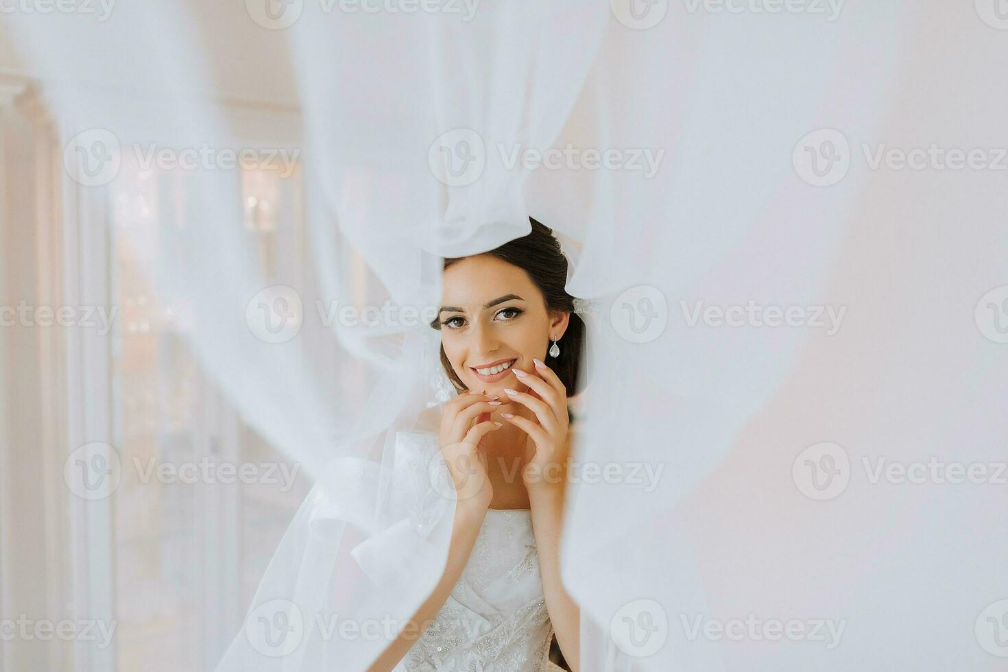 Beautiful bride. portrait. wedding makeup hairstyle, gorgeous young woman in white dress at home. series photo