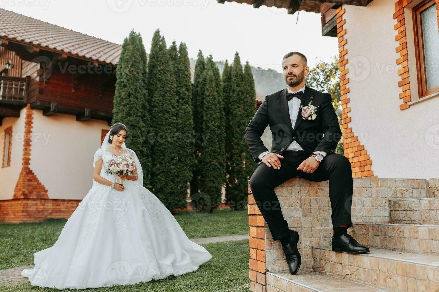 happy newlywed wife and husband outdoors and enjoying their wedding day. Sincere feelings of two young people. The concept of true love. photo