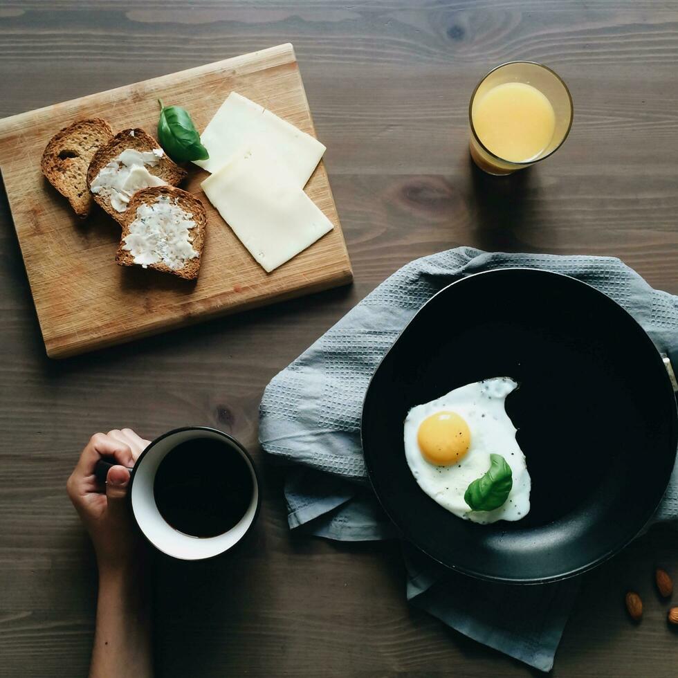 Cappuccino with cream in a white cup on the table photo