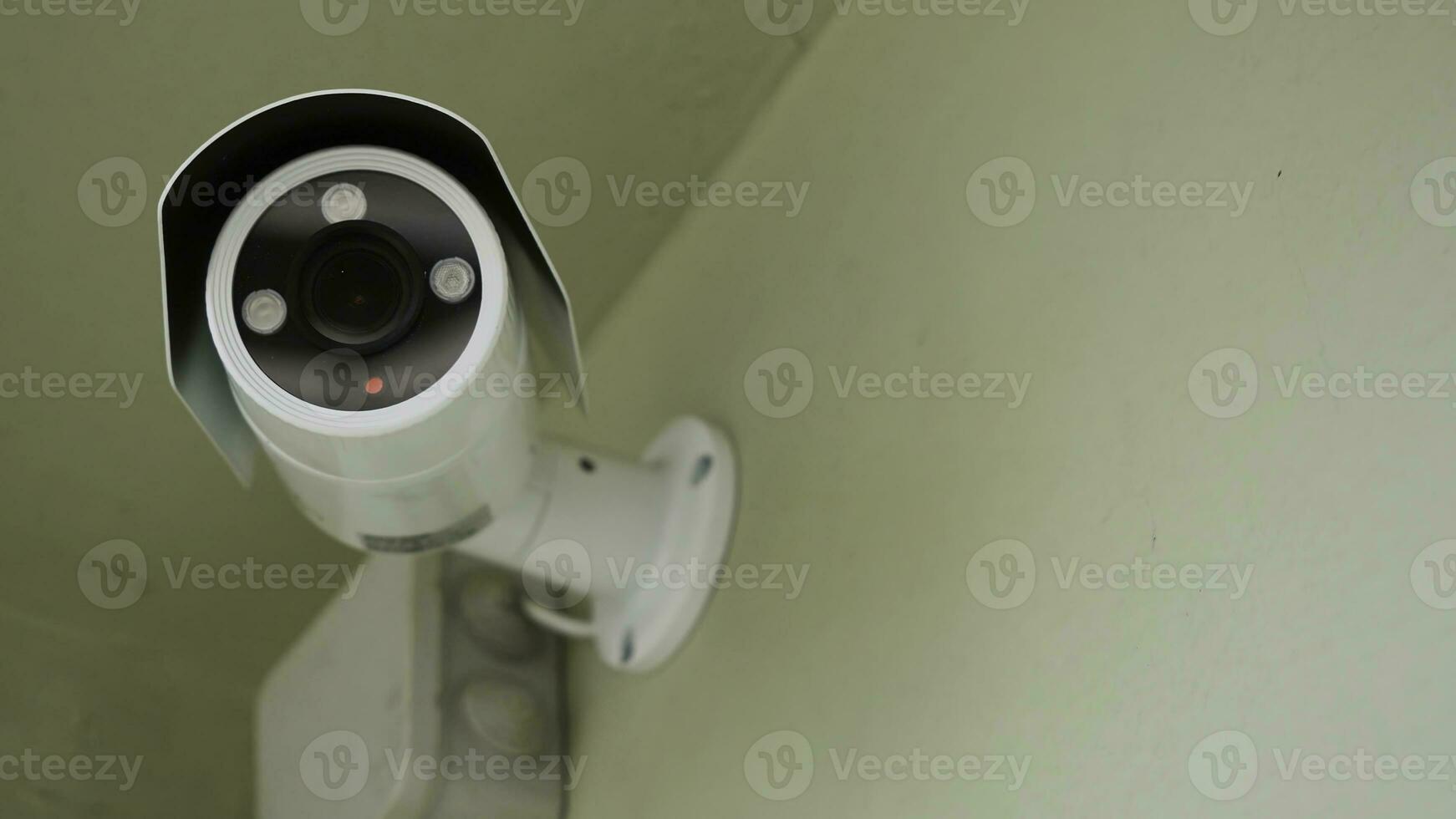 cctv installed on the wall to property security, indoor security. Indoor surveillance camera, closeup photo