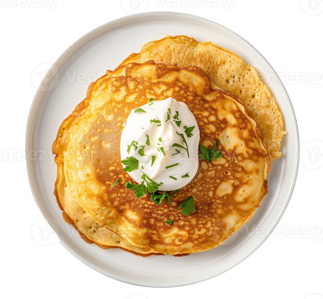 AI generated A plate of chickpea pancake with a dollop of cashew sour cream top view isolated on a transparent background png