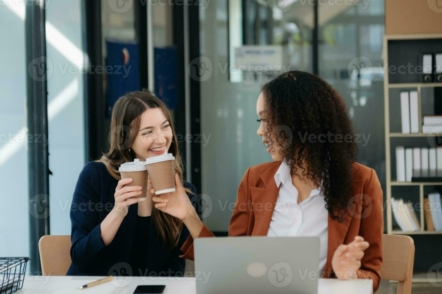 Business colleague business presents and explains and using laptop and tablet. Teamwork, financial marketing team, photo