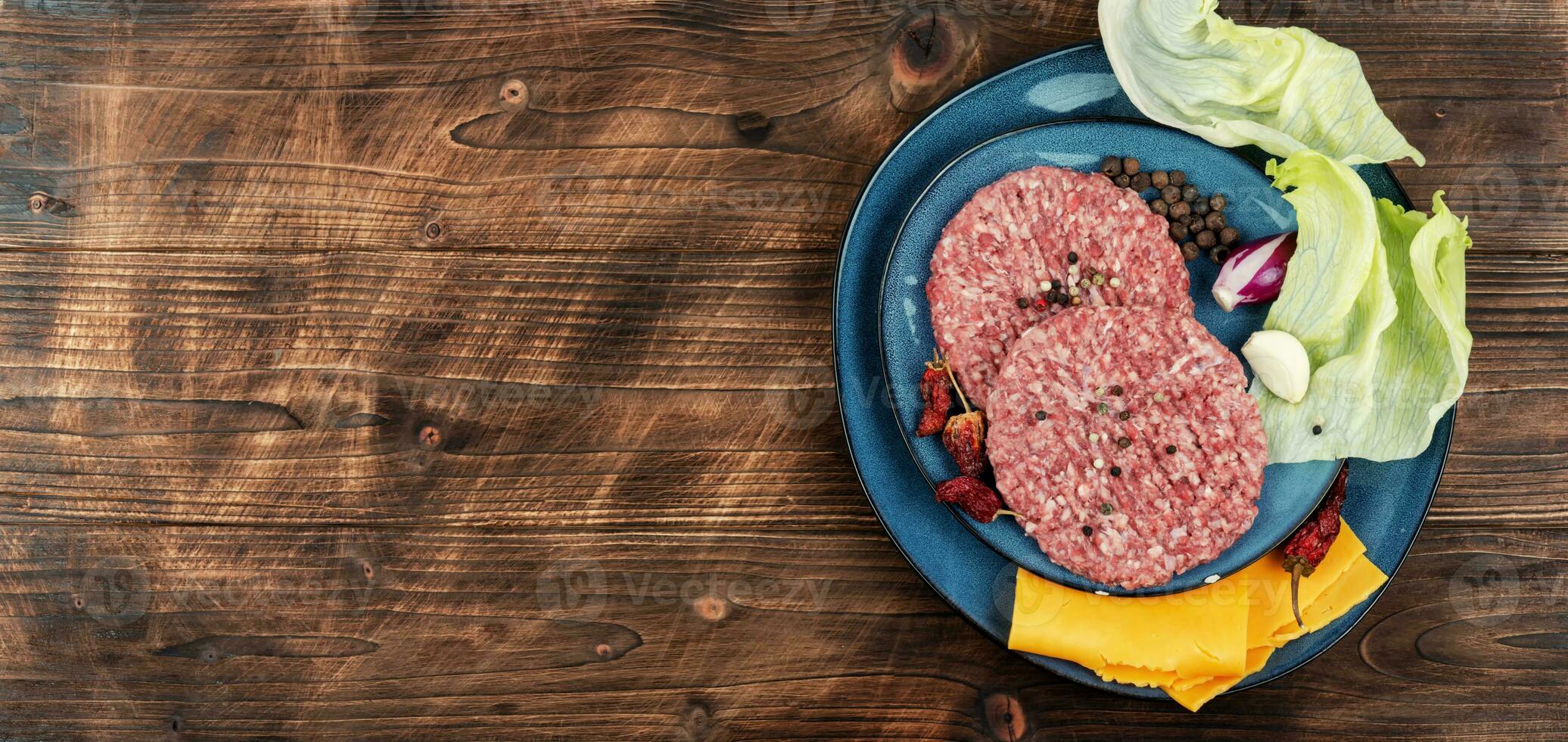 Raw cutlet of minced meat photo