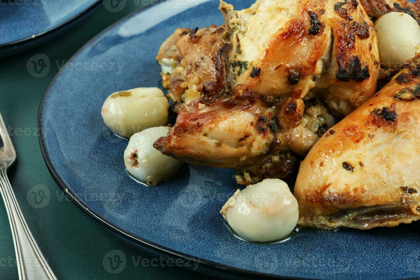 Chicken carved into pieces with lychee. photo