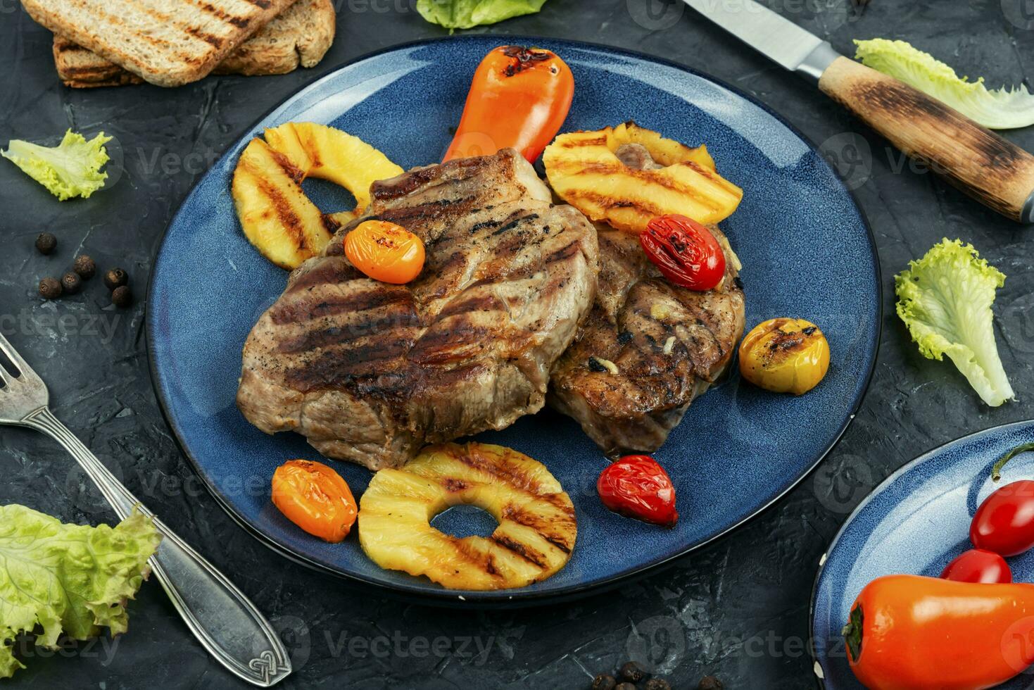 Grilled pork chop steak with ananas. photo