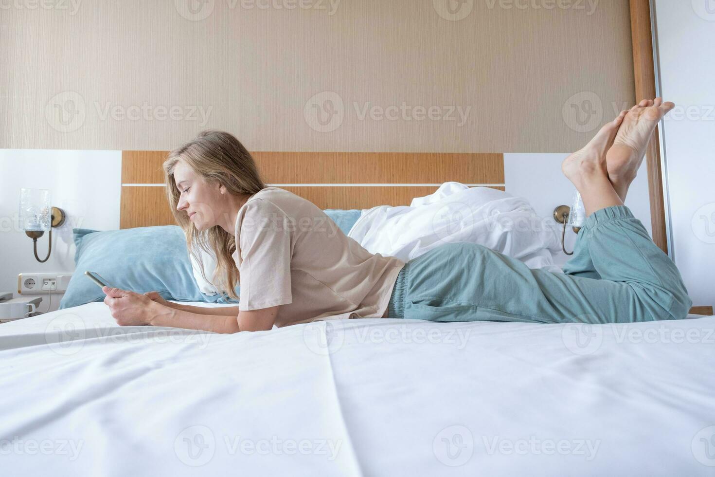 Woman lying in bed after wake up 36709268 Stock Photo at Vecteezy
