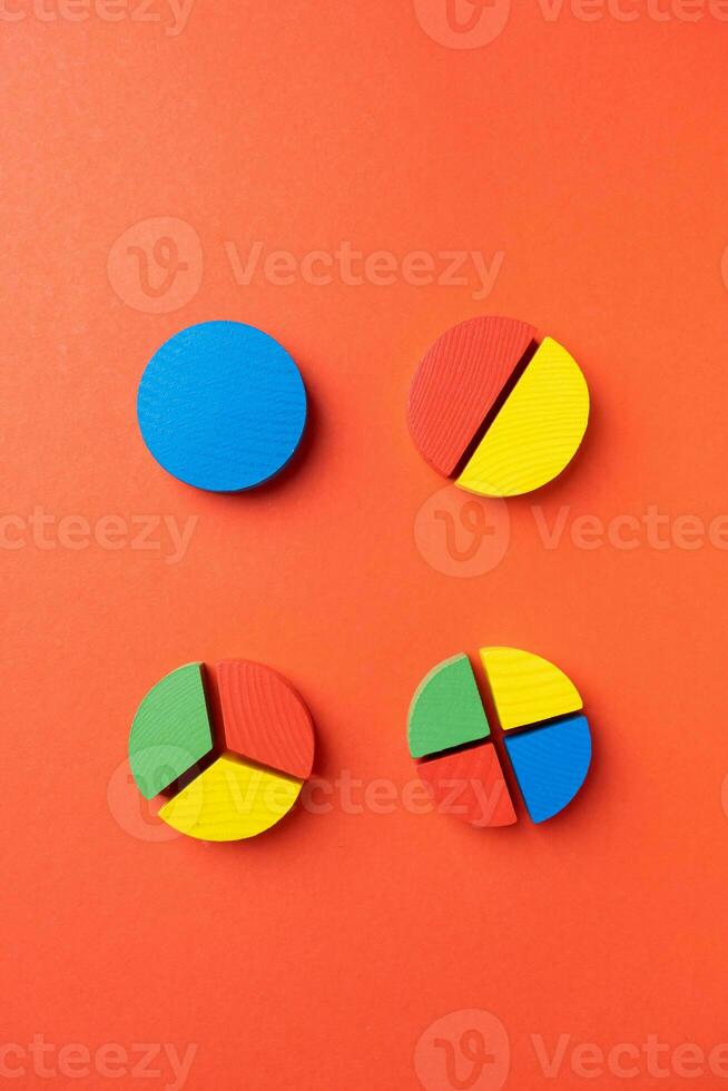 Colorful wooden pie chart pieces photo