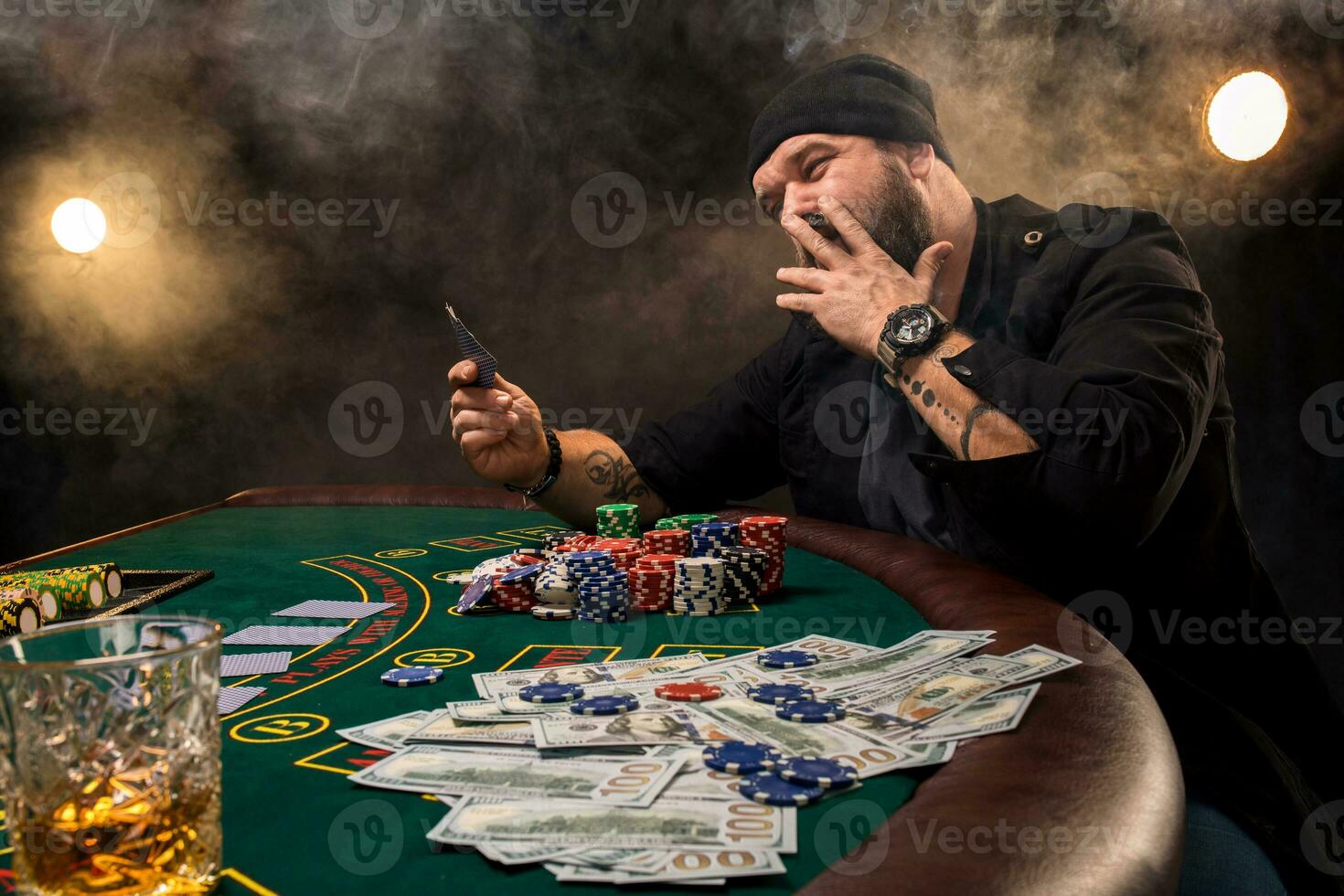 Man is playing poker. Emotional fail in game, game over for card player, man very angry with foolish choices, losing all the chips on bank. photo