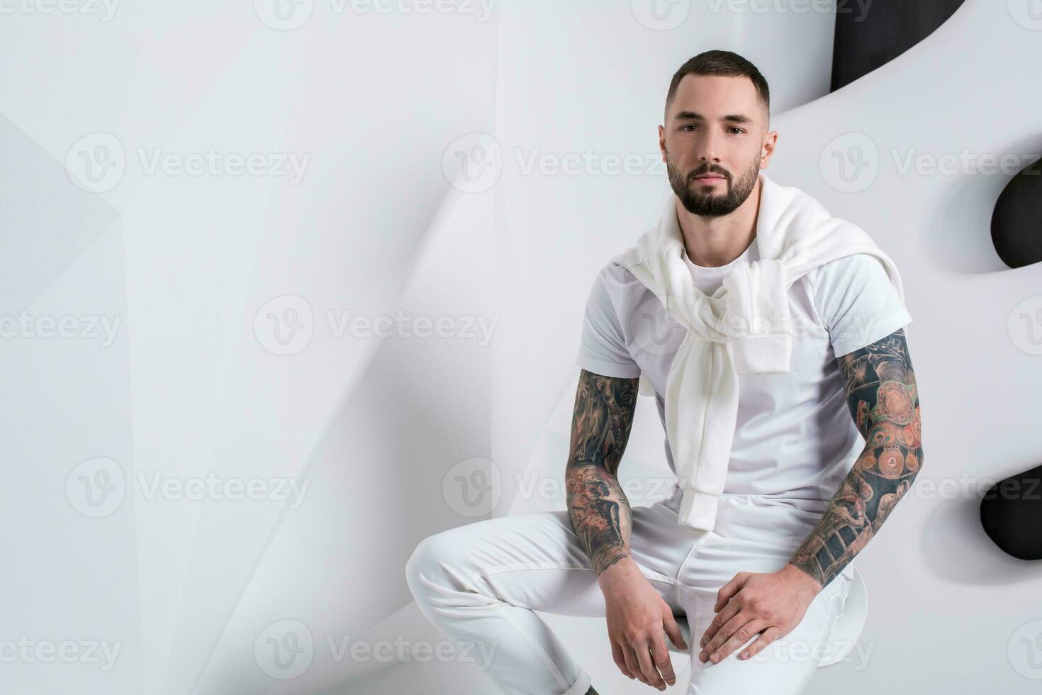 Handsome male model wear white clothes photo