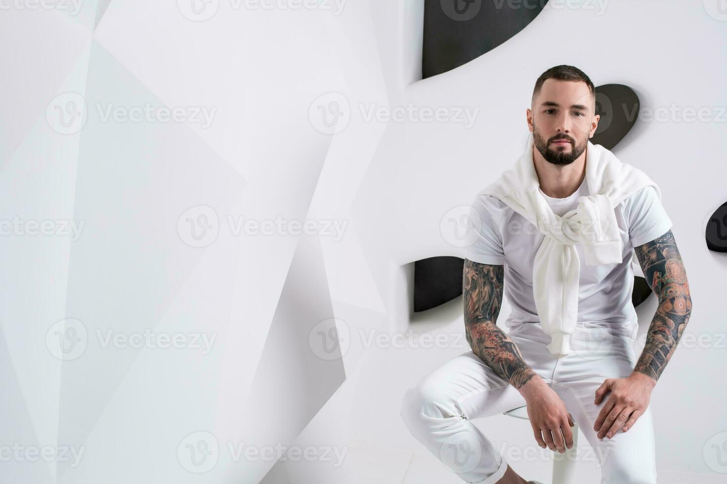 Handsome male model wear white clothes photo