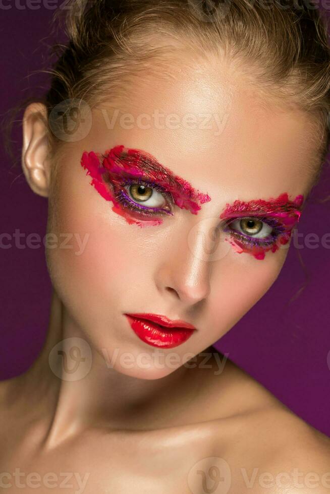 Beauty woman face closeup isolated on black background. Beautiful photo