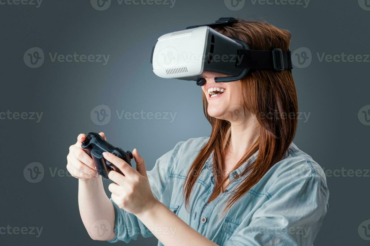 young woman using a VR headset glasses photo