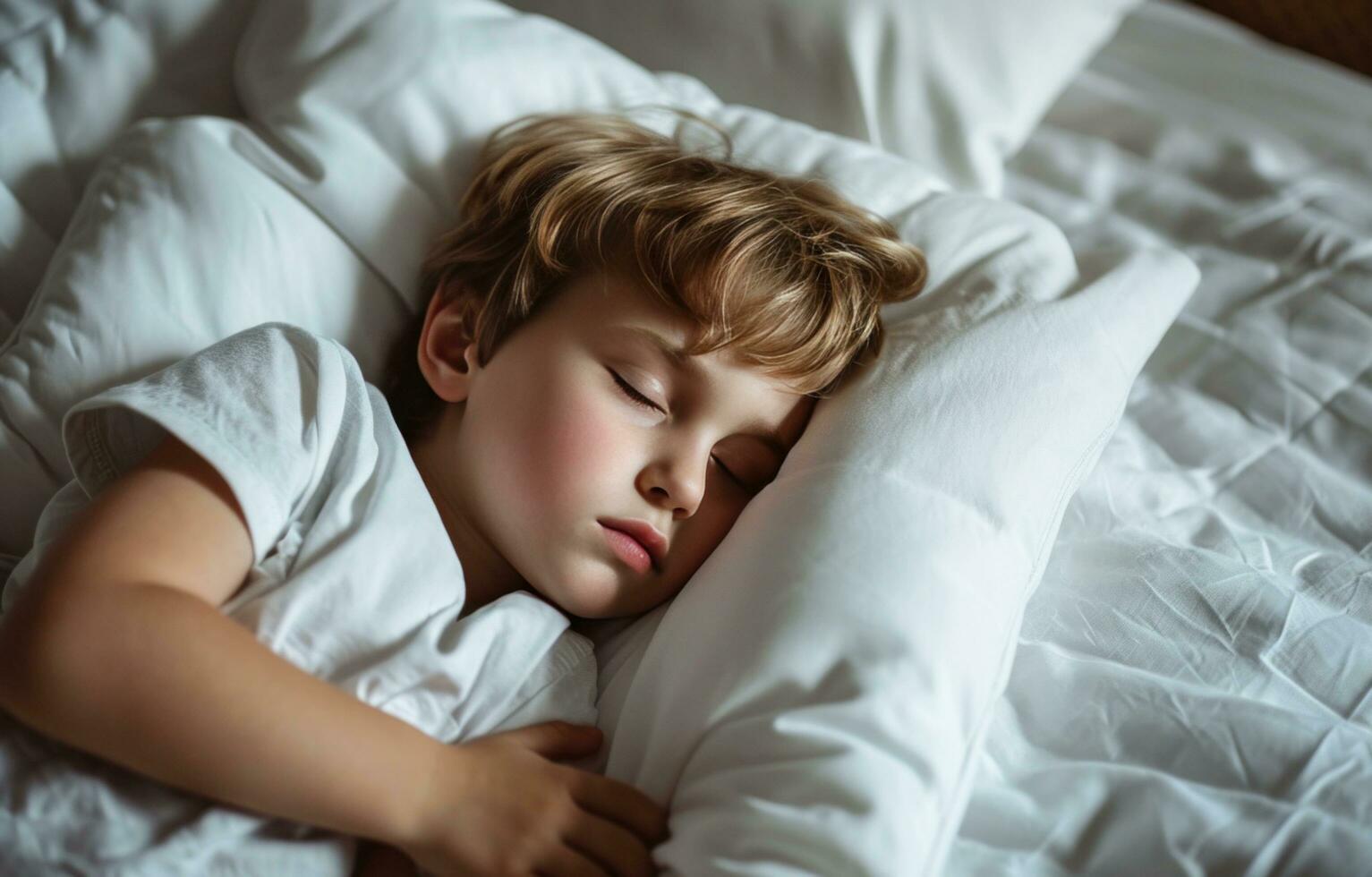 AI generated a small boy sleeping on a white pillow photo