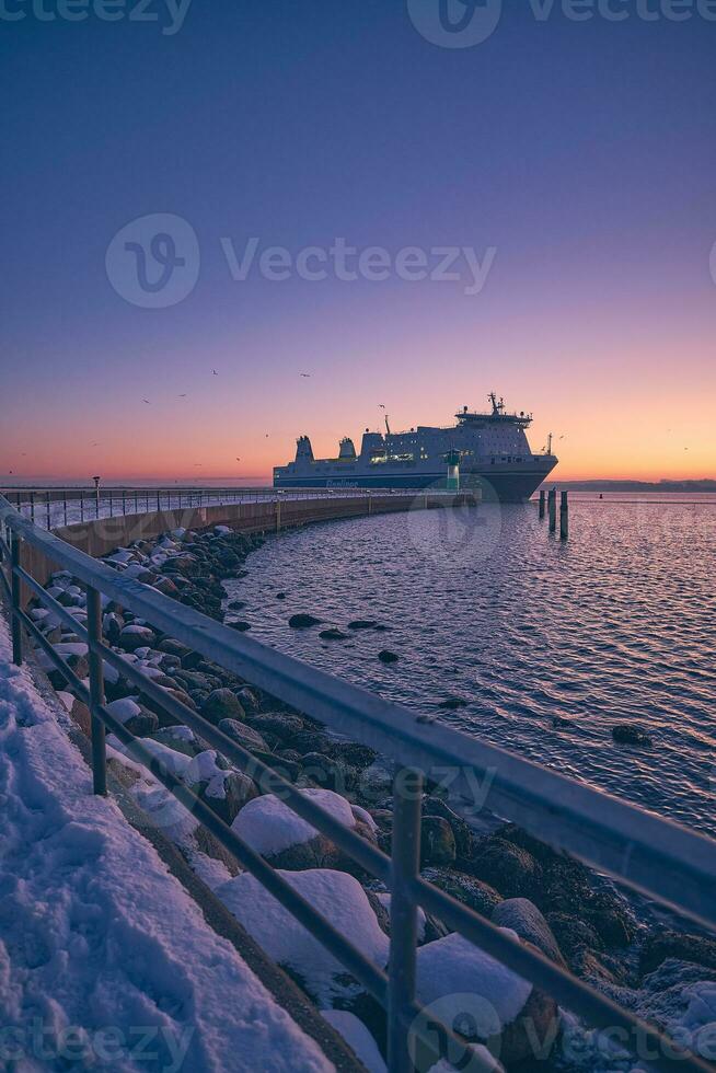 Nordermole in Travemunde with ferry photo