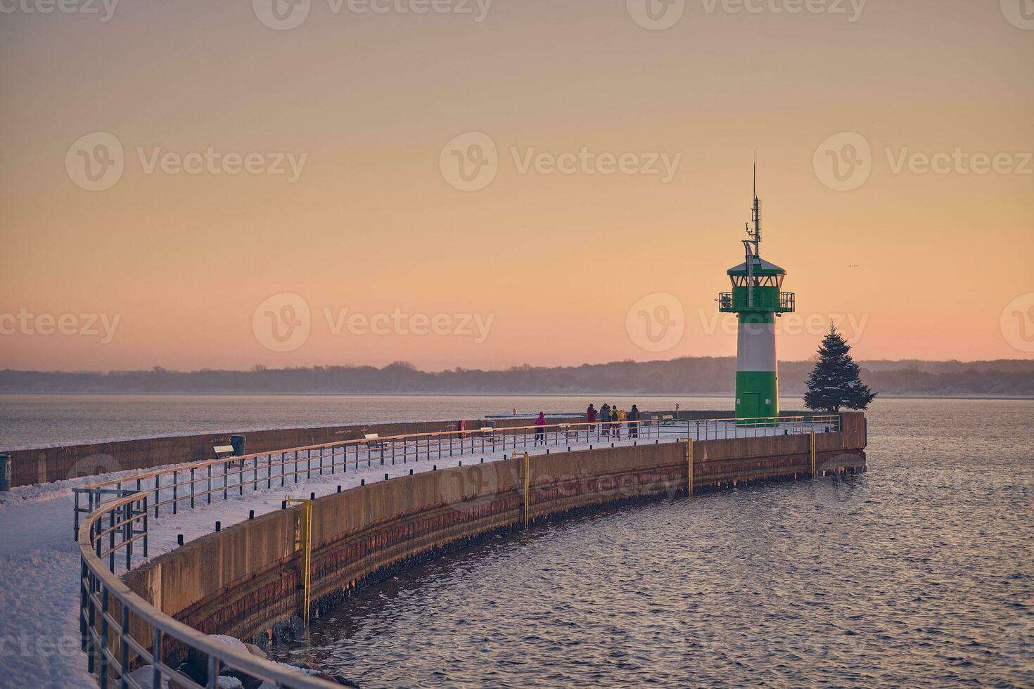 Lighthouse on the Nordermole at Travemunde in northern Germany photo