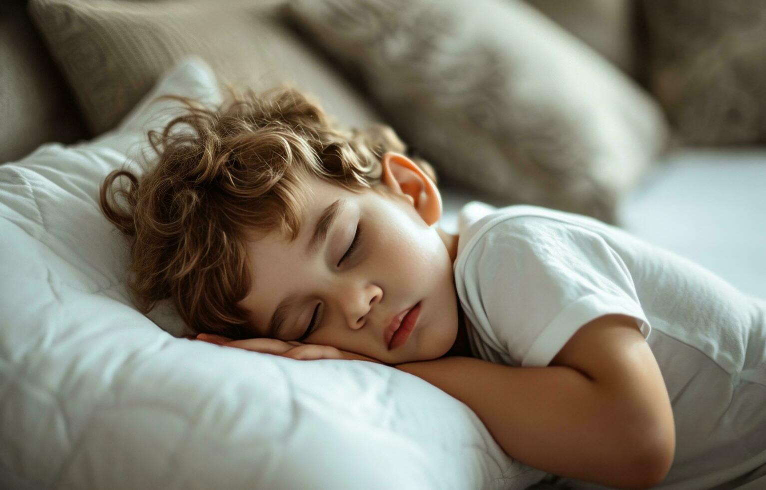 AI generated a small boy sleeping on a white pillow photo