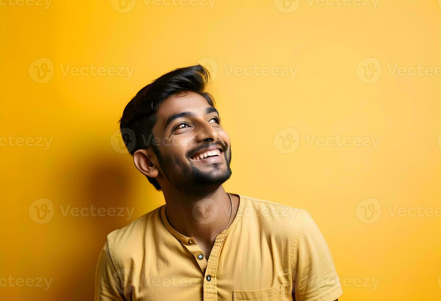 AI generated Happy joyful smiling young indian man looking aside up thinking photo